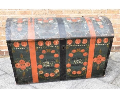 A LARGE SCANDINAVIAN METAL BOUND PAINTED PINE DOME TOP TRUNK  with floral painted decoration initialled and dated 1856 to the
