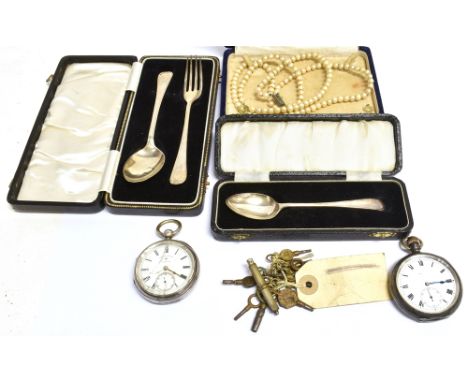 A MISCELLANEOUS COLLECTION Comprising two silver open faced pocket watches, a collection of watch keys, a cased silver teaspo