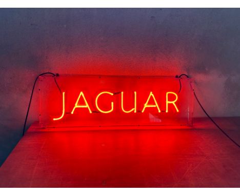 A rare Jaguar light-up neon showroom advertising sign made by Brillite, 35 x 11 1/2, 2" depth.