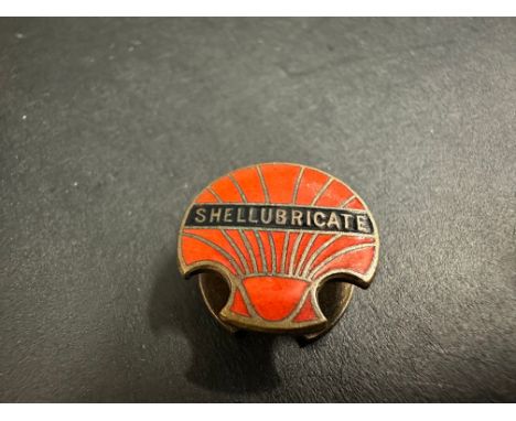 A Shellubricate enamel lapel badge by Fattorini &amp; Sons.