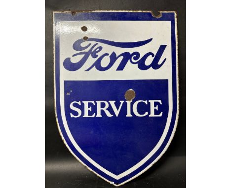 A Ford Service shield-shaped double sided enamel advertising sign, 23 1/2 x 33".