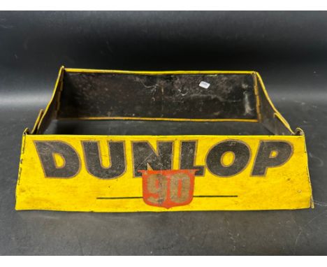 A Dunlop 90 tyre display stand, heavily restored.