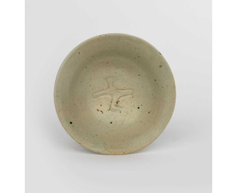 ‡ Bernard Leach CBE (1887-1979)A Leach Pottery stoneware shallow bowl, incised to the well with a flying bird motif, glaze sp