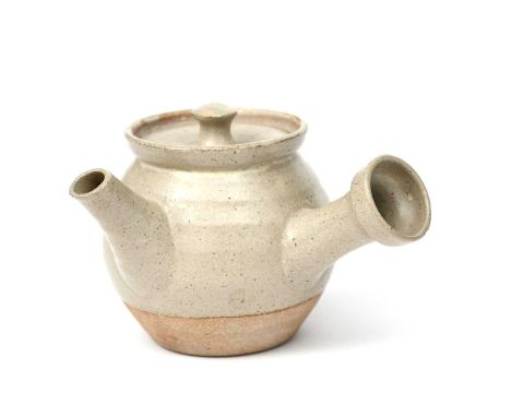 Richard Batterham (1936-2021)an early stoneware teapot and cover, ovoid with side handle, covered to the base in a pale ash g