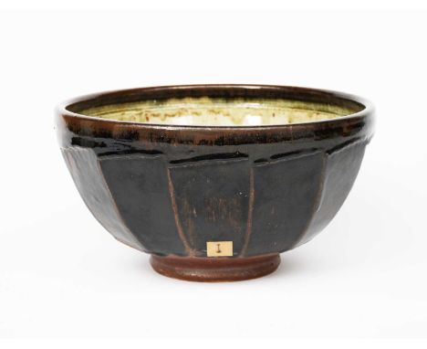 Richard Batterham (1936-2021)a large cut-sided stoneware bowl, covered in an ash glaze, the exterior black iron,unsigned 35.5
