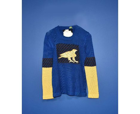 A The Ritva Man acrylic jumper designed by Dame Elisabeth Frink and The Ritva Man, blue with yellow arms, with an embroidered