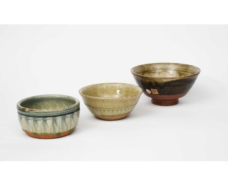 Richard Batterham (1936-2021)a stoneware footed bowl with chatter band, ash glaze to interior, the exterior dark iron, a cut 