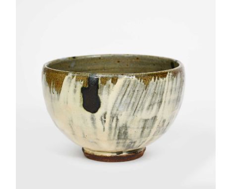 ‡ William Bill Marshall (1923-2007)a stoneware unomi, footed form brushed with hakeme over ash,impressed seal mark, 14.5cm. w