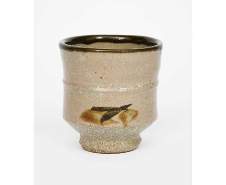 Shoji Hamada (1894-1978)a stoneware unomi, footed cylindrical form, simple brushed design and rim band on an ash glazeunsigne