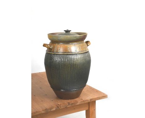 ‡ Reuben Batterham (born 1967)an extra large stoneware beer jar and cover, with applied handles, incised with flower motif to