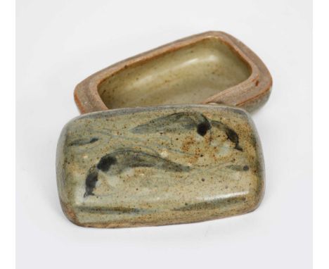 ‡ Bernard Leach CBE (1887-1979)a stoneware box and cover, rounded rectangular form, the cover painted with two birds in a wea