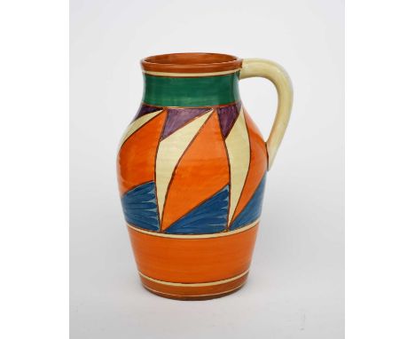 'Original Bizarre' a Clarice Cliff Bizarre Lotus jug, painted with orange, blue and purple triangles, outlined in brown, betw