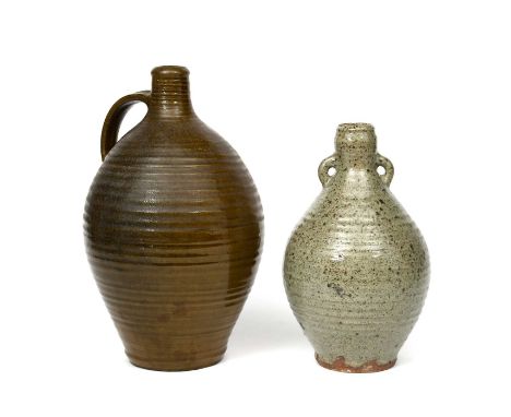 Richard Batterham (1931-2021)an early flagon, ribbed form with applied handle, covered in a green glaze to the foot, and a tw