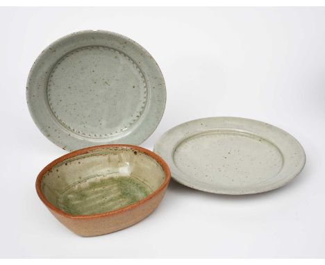 Richard Batterham (1936-2021)two graduated stoneware plates with chatter band, with white slip and a stoneware oblong dishuns