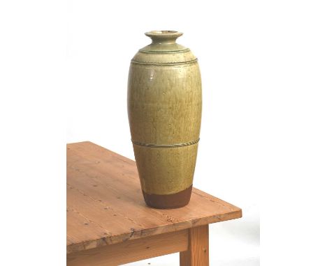 Richard Batterham (1936-2021)a tall two-piece stoneware bottle, with single chatter band, covered to the foot with an ash gla