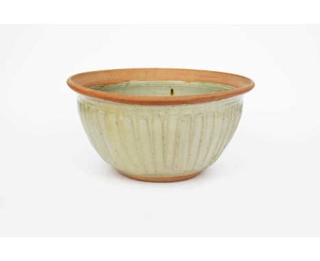 ‡ Reuben Batterham (born 1967)a large stoneware mixing bowl made at the Durweston Pottery, with cut column design, glazed fro