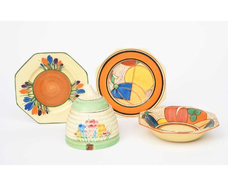 'Melon' a Clarice Cliff Fantasque Bizarre side plate, painted in colours, inside orange and black bands, a Clarice Cliff 'Mel