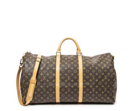 Louis VUITTON, année 1999. Sac 'Keepall Bandoulière' en toile Monogram et cuir naturel.Fermeture zippée à double curseur, dou