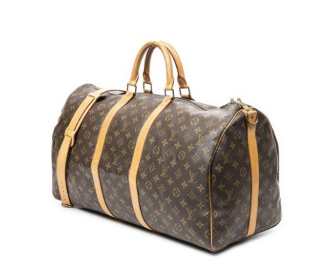 Louis VUITTON, année 1991. Sac 'Keepall Bandoulière' en toile Monogram et cuir naturel.Fermeture zippée à double curseur, dou