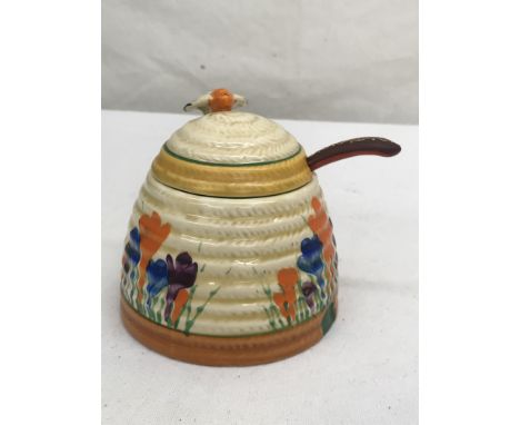 A Clarice Cliff 'Crocus' pattern pot marked 'Wilkinson' to base