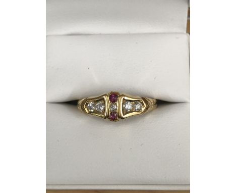 An 18ct ruby and diamond ring