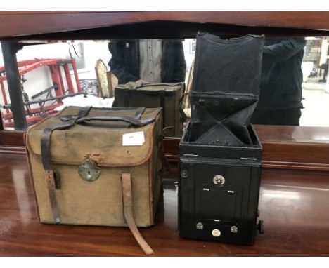 An early 20th century Thornton Pickard special ruby reflex in box with slides