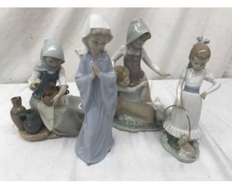 Two Nao figurines; together with a Lladro figure (A/F)