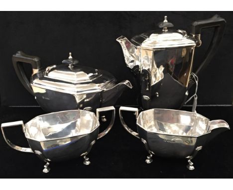 A four-piece silver tea set to inc coffee pot, tea pot, sucrier and creamer