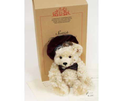 A Steiff Scottish Teddy Bear 2001, limited edition no435/3000, white mohair teddy bear complete with hat, hat brooch, ear tag