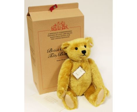 A Steiff British Collectors' Teddy Bear 2001, limited edition no409/4000, brass mohair teddy bear complete with ear tag, cert