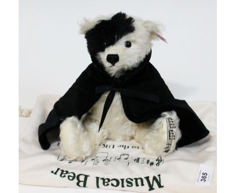 A Steiff Musical Bear "Phamtom of the Opera", limited edition no1418/3000, white and black mohair teddy bear complete with ca