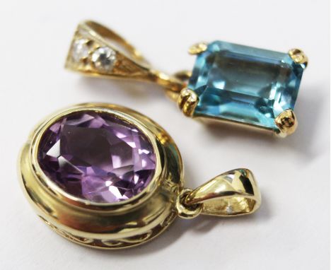 A hallmarked 14ct gold pendant set with purple amethyst, total length 2cm, gross weight 2.2g. togethr with a hallmarked 9ct g
