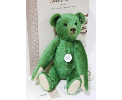 A Steiff Teddy Bear 1908 Replica, limited edition no1435/3000, green mohair teddy bear complete with ear tag, box and certifi