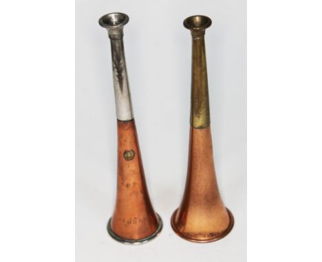A copper and nickel hunting horn marked 'SC PT Quorn' with horse shoe emblem, together with a copper and brass example, lengt