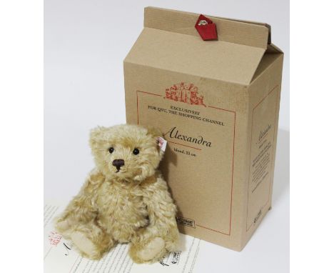 A Steiff Alexandra bear, limited edition no130/1500, exclusively for QVC, blond mohair teddy bear complete with 9ct gold diam
