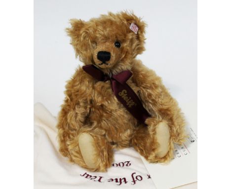 A Steiff Bear of the Year 2004, limited edition no 134/1500, reddish brown mohair teddy bear complete with bow, ear tag, bag 