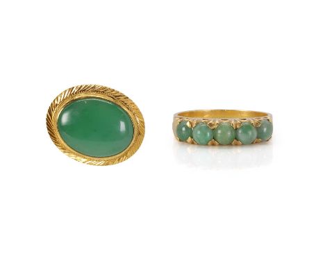 A jade ring and a jade earring/stud, the ring set with five round cabochon jades, in a carved half hoop setting, claw set, wi