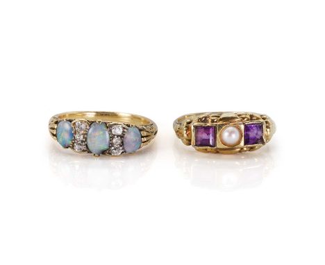 Two antique gem set gold rings, comprising a ring with three opal cabochons interspersed two rows of three rose cut diamonds 