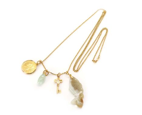 A gold chain with four pendants, a diamond cut trace link chain, stamped 22ct and tested as high carat gold, 800mm long, toge