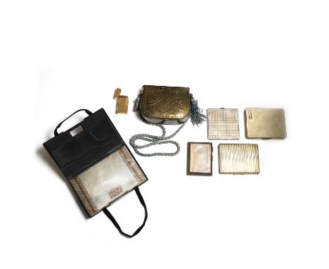 A collection of silver cigarette cases and other items,  comprising:  a group of silver cigarette cases, a silver gilt cigare