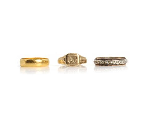 Three gold rings, comprising a 22ct gold wedding ring, London 1966, a 9ct gold signet ring, Birmingham 1956 and a 9ct gold sy