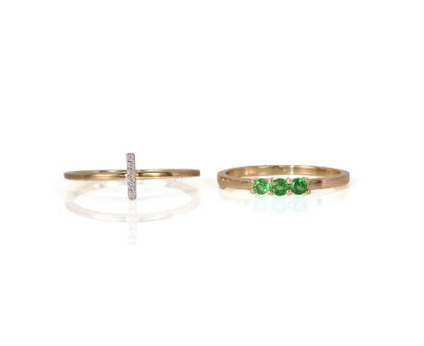 A diamond vertical cluster ring and a three stone garnet ring, comprising a vertical diamond bar ring, with round brilliant c