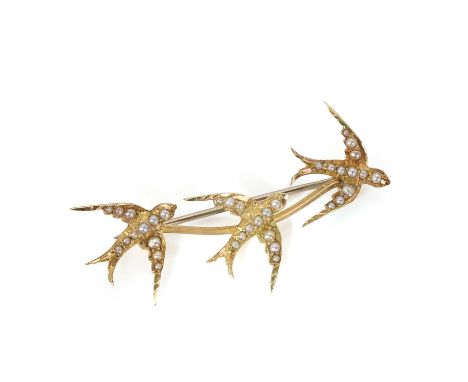 A late Victorian split pearl swallow brooch, designed as three swallows set with graduating split pearls, mounted on a curved