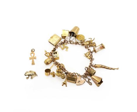 A gold charm bracelet, a gold hollow curb link bracelet, 160mm long, Birmingham 1904, suspending nineteen gold charms to incl