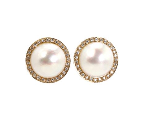 A pair of 9ct gold Mabé pearl and diamond stud earrings, with a central Mabé pearl, 12mm diameter, to a surround of brilliant