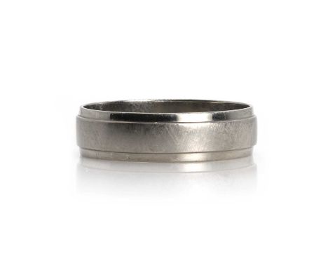 A platinum wedding ring, a plain brushed band with stepped polished edges, hallmarked Sheffield, 6.95gRing size XCondition Re