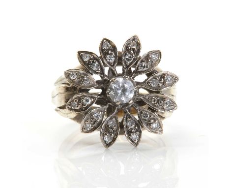 A white gold cubic zirconia and diamond daisy cluster ring,  the 18ct white gold ring head claw set with a later round mixed 