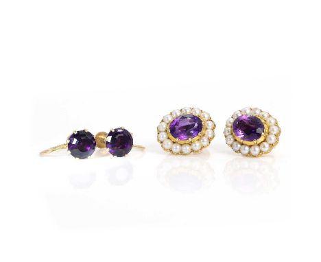 Two pairs of gold amethyst screw back earrings, comprising a pair of gold amethyst screw back earrings, with a round cut amet