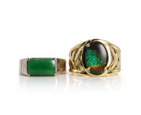 Two gentlemen's gold rings, comprising a 9ct gold ammolite ring, with an oval ammolite triplet, claw set to wide tapered shou