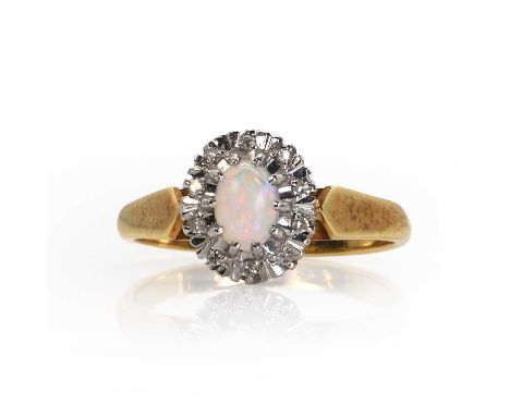 An 18ct gold opal and diamond cluster ring,  with an oval opal cabochon, claw set to a white surround of illusion set eight c